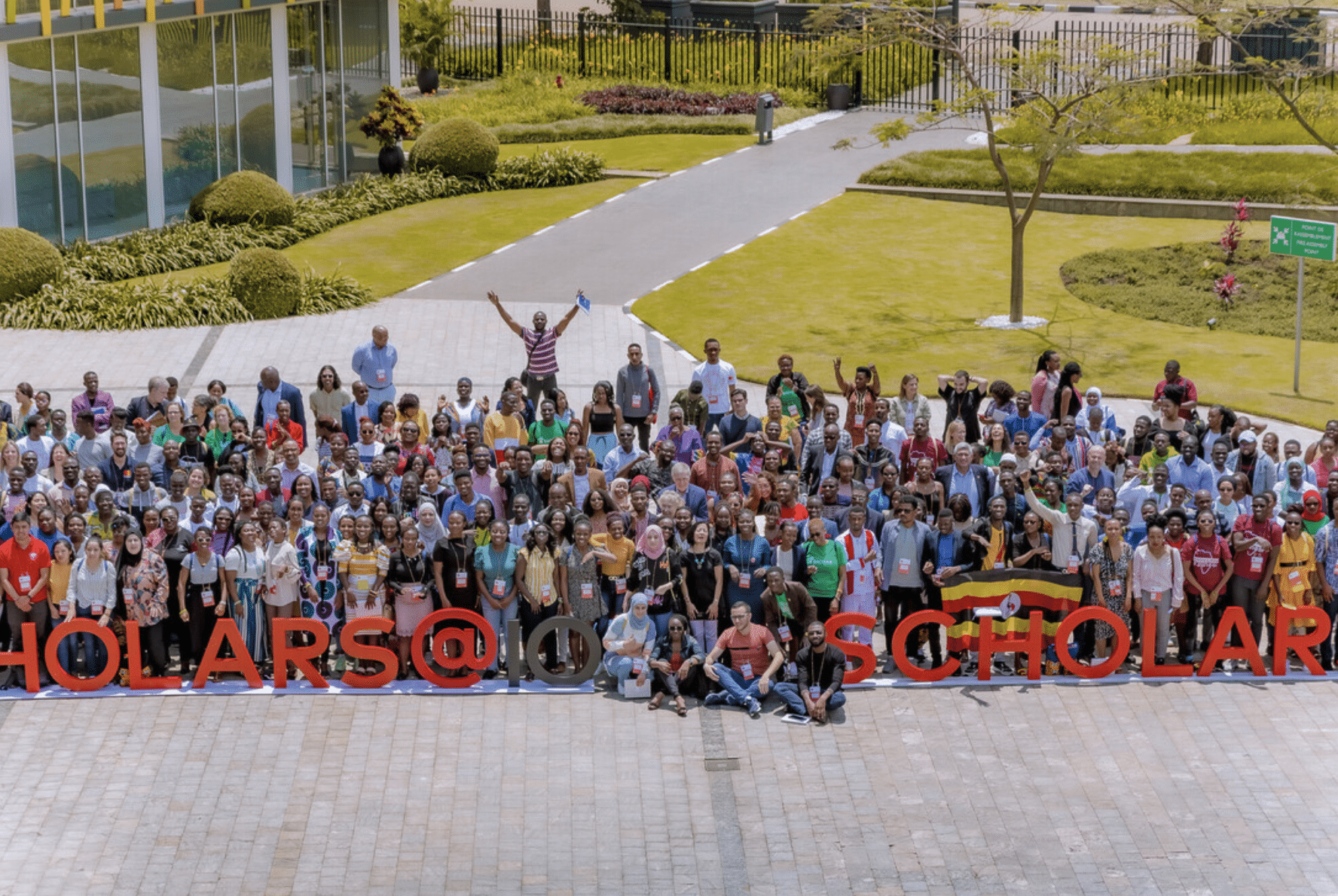 Mastercard Foundation Baobab Summit 2022 Group Photo in front of Scholars at 10 sign